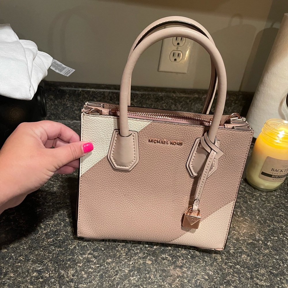 Michael Kors purse -color damage back side handles